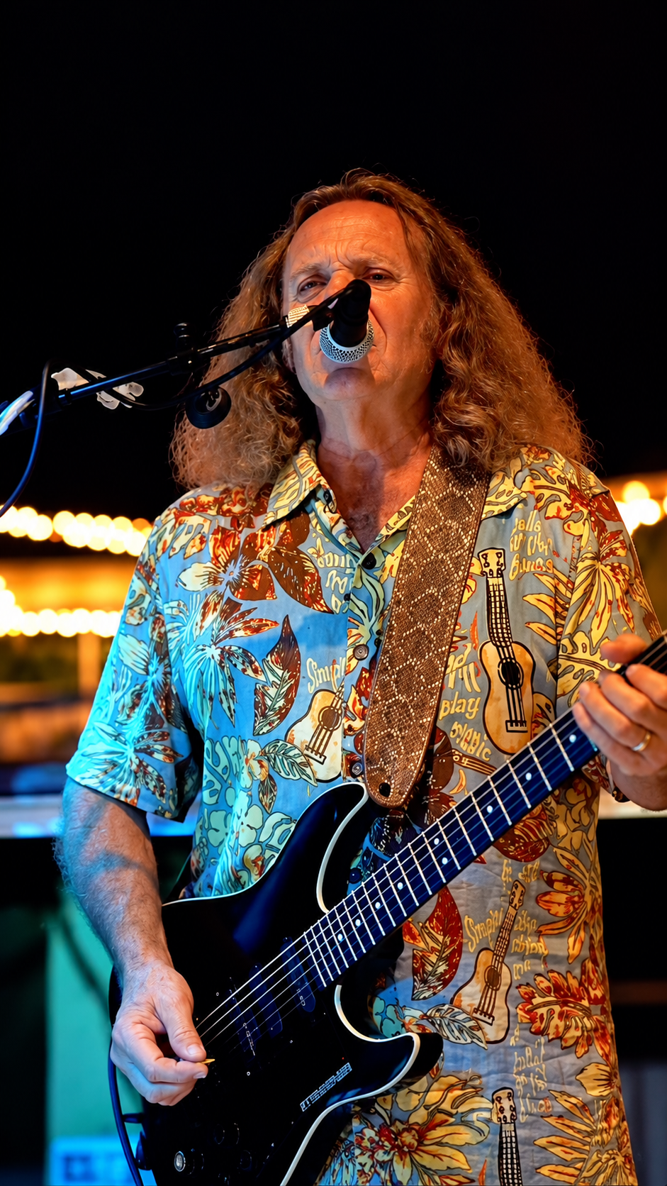Live band guitarist performing at Celebration Park Naples
