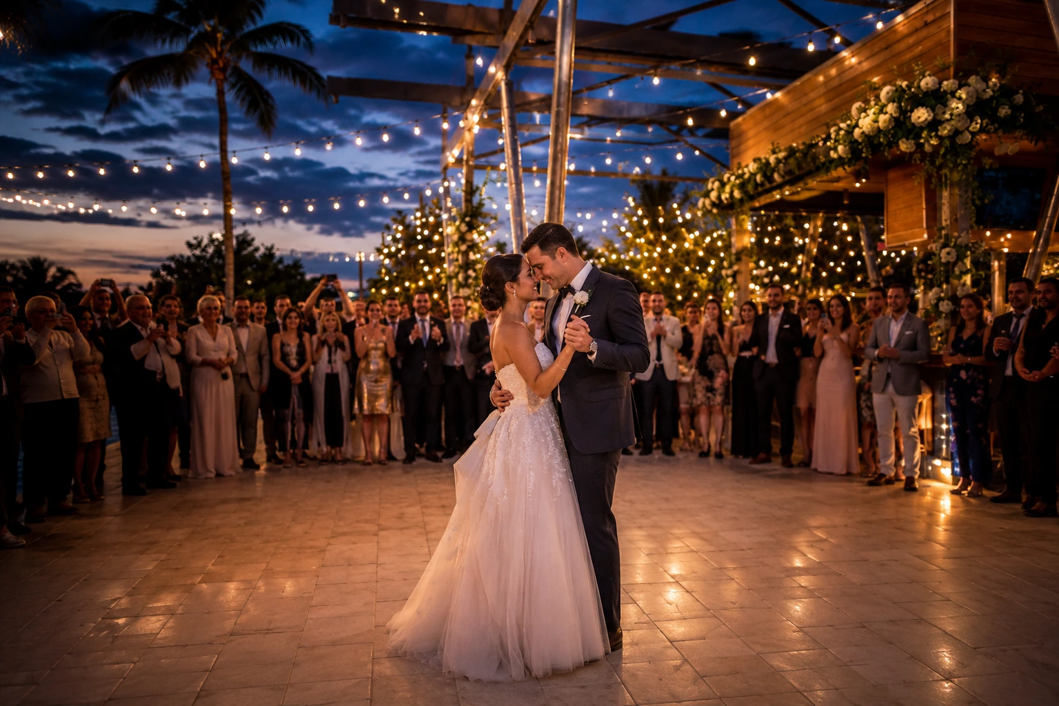 Bride and groom first dance under string lights at Celebration Park Naples